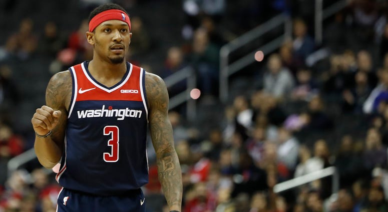 Bradley Beal reacts on the court in overtime against Toronto Scott Brooks: Bradley Beal one of NBA's 'best two-way players'
