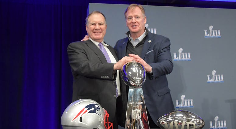 Bill Belichick and Roger Roodell pose with the Lombardi Trophy. Bill_Belichick_Roger_Goodell