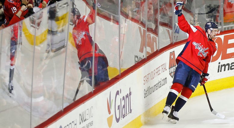 Kuznetsov celebrates after scoring in the third period against the Kings, one of four points he registered in the game. Kuznetsov has been 'dazzling' since the All-Star break