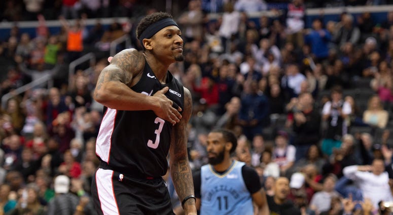Bradley Beal reacts after scoring in the fourth quarter of a 135-128 win over Memphis. Beal scored 40 points in the win, his second-straight night eclipsing that threshold. Beal hits another level as Wizards grasp to playoff hopes