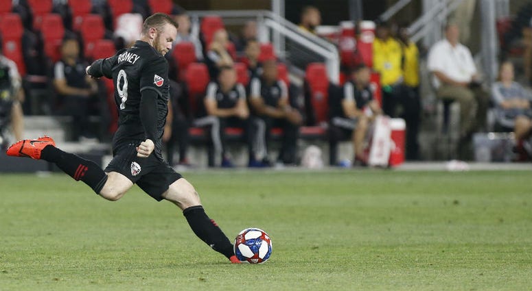 D.C. United's Wayne Rooney scores an absurd goal from his own half. D.C. United's Wayne Rooney scores an absurd goal from his own half.