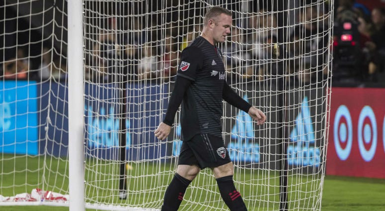 D.C. United's Wayne Rooney makes long walk after red card. Wayne Rooney sees red in D.C. United defeat