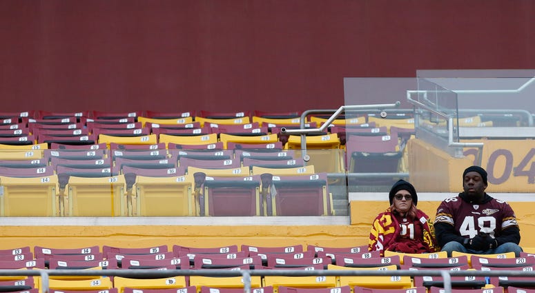 Redskins fall behind Nationals as D.C. fans' favorite team. Redskins fans watch from the stands against the New York Jets