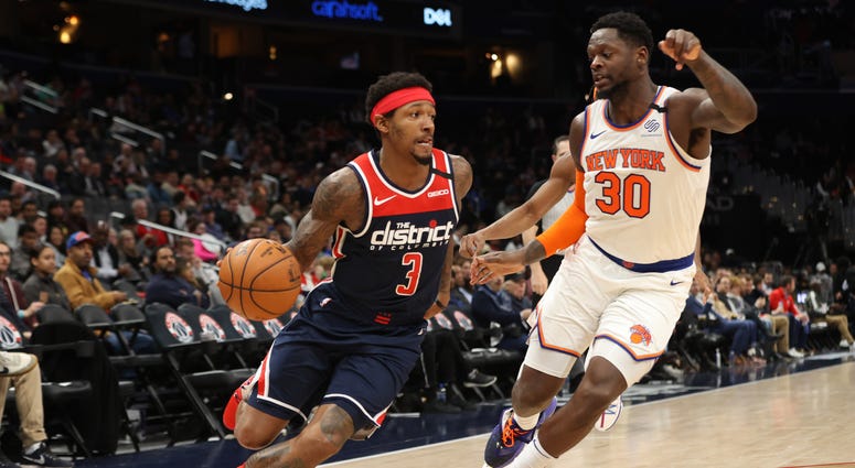 Wizards guard Bradley Beal drives to the basket against the Knicks. Bradley Beal says he has not yet decided if he will play when the NBA restarts in Orlando.