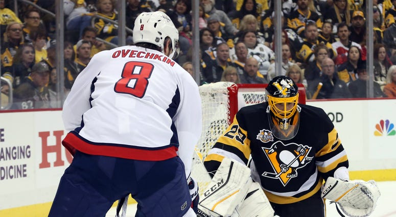 Alex Ovechkin stares down Marc-Andre Fleury alex_ovechkin_caps