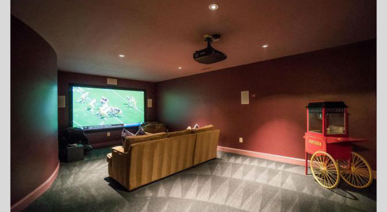 Home theatre inside Bruce Allen's home. Bruce Allen's McLean, Virginia mansion is up for sale again.
