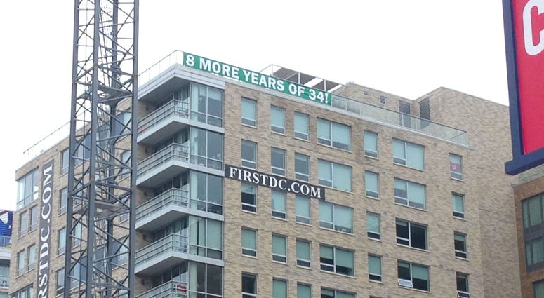 A sign across from Nationals park beckons for eight more years of Bryce Harper bryce-harper-sign-8-more-years