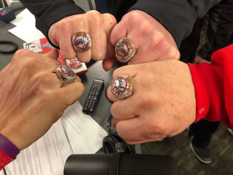 The Junkies and their Stanley Cup rings. Junkies_Stanley_Cup