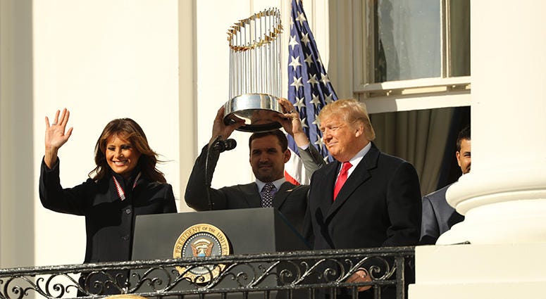 Ryan Zimmerman hoists the Commissioner's Trophy as the World Series champion Nationals are honored with a White House ceremony Ryan Zimmerman – Nationals' White House Visit