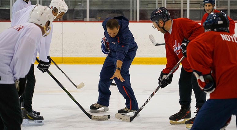 Cakes takes the face-off in the 2019 Capitals Media Fantasy Camp Sports Junkies host John 'Cakes' Auville takes the face-off in the 2019 Capitals Media Fantasy Camp