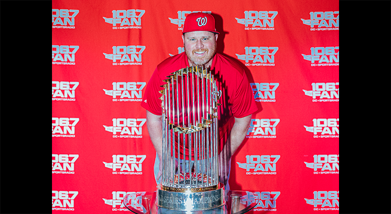 Senior 106.7 The Fan writer Chris Lingebach poses with the World Series Trophy Senior 106.7 The Fan writer Chris Lingebach poses with the World Series Trophy