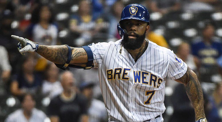 Eric Thames reacts after hitting a walk-off home run for the Brewers in 2019 Nationals to sign Eric Thames to one-year deal