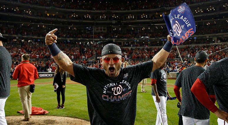Gerardo Parra waves a pennant signifying the Nats winning the National League pennant Gerardo Parra Pennant