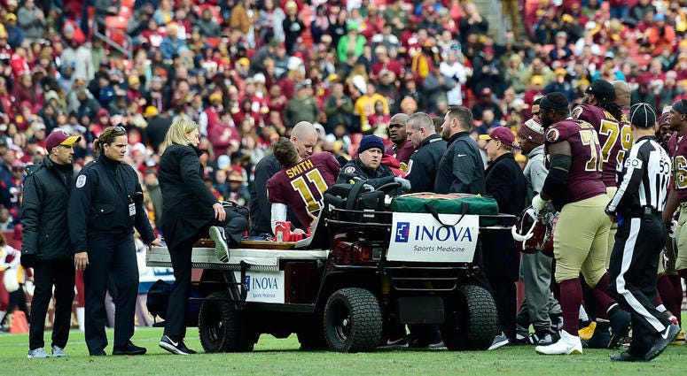 Alex Smith is carted off the field after injuring his leg against the Texans on Nov. 18 Alex_Smith_Injury