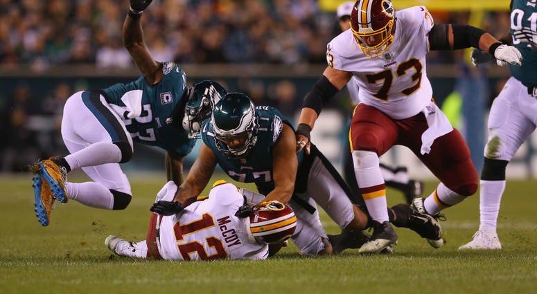 Colt McCoy hits the turf from a first-quarter sack by the Eagles Colt_McCoy_Injury