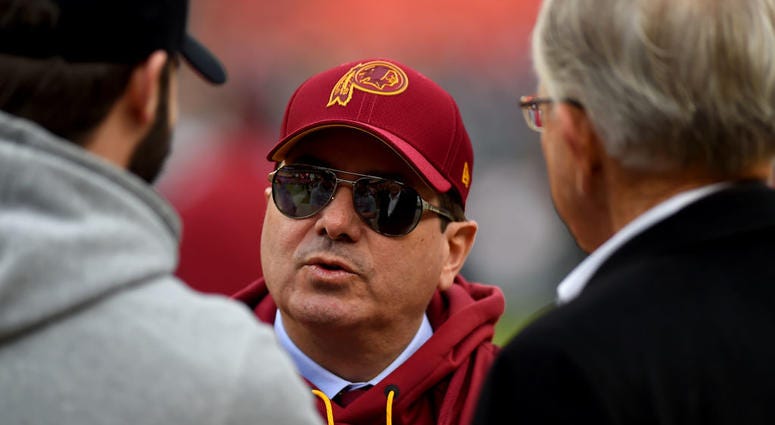 Redskins owner Daniel Snyder confers with Joe Gibbs on the sideline before the team's final regular-season game against the Eagles, a 24-0 shutout. Dukes: Dan Snyder needs to publicly apologize to Redskins fans
