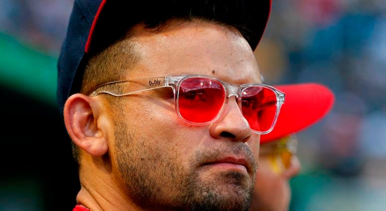 Baby Shark wasn't the only thing Gerardo Parra brought: The red Bubly sunglasses were big, too. Gerardo Parra of the Washington Nationals wearing his famous red-tinged sun glasses.