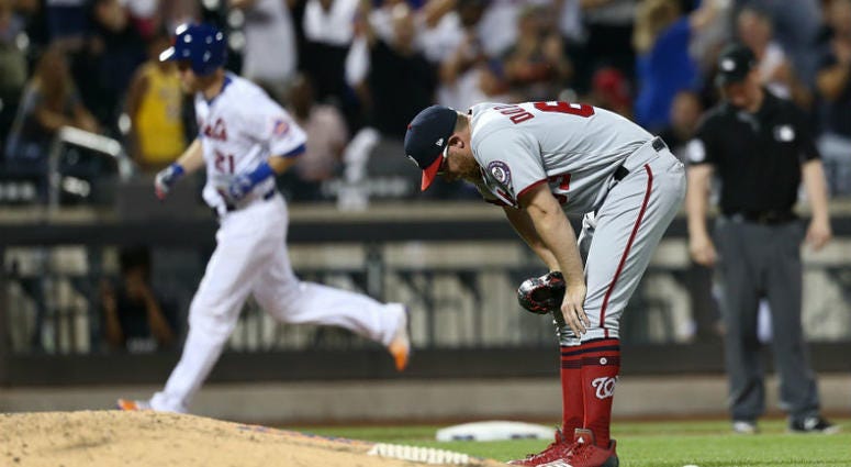 Sean Doolittle reacts after allowing a game-tying HR. It's déjà vu all over again for Sean Doolittle and Nationals bullpen vs. Mets.