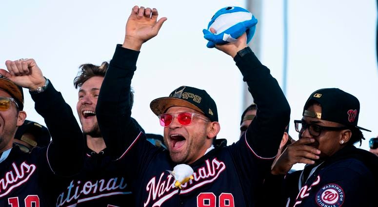 Baby Shark at the Nationals World Series parade. Gerardo Parra of the Washington Nationals cheers during a parade to celebrate the Washington Nationals World Series victory.