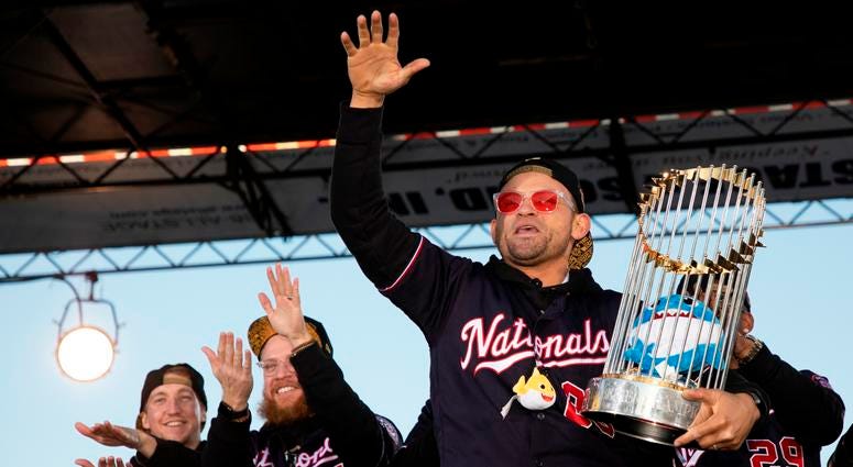 Baby Shark is gone. Gerardo Parra is off to play in Japan. Gerardo Parra of the Washington Nationals holds the Commissioner's Trophy on stage during Nats World Series parade.