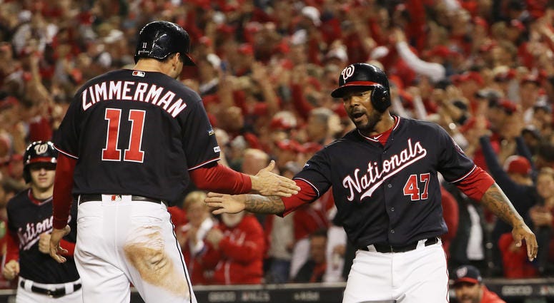 The Nationals still have questions to answer about how the infield will look in 2020. Ryan Zimmerman celebrates scoring with Howie Kendrick of the Washington Nationals in the first inning against the St. Louis Cardinals.