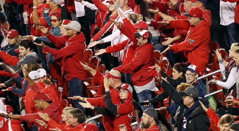 Nats fans loved doing the "Baby Shark" dance. Fans take part in the Baby Shark song as Gerardo Parra (not pictured) of the Washington Nationals comes up at bat against the Houston Astros during the sixth inning in Game 3.