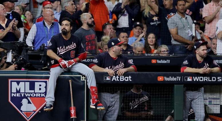 Anthony Rendon waiting for the umps to make a call. He said he liked waiting. Best pictures of World Series umpire controversy, Dave Martinez ejection