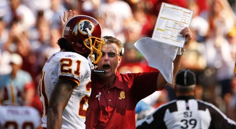 Gregg Williams congratulates Sean Taylor after a blocked punt in an Oct. 2007 game against the Lions Redskins and Gregg Williams would be all fireworks