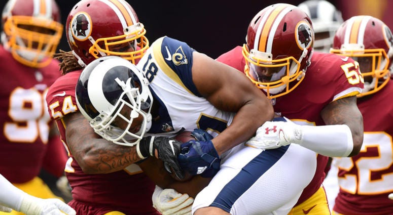 Redskins linebackers Mason Foster (54) and Zach Brown (53) make a tackle against the Rams Redskins reportedly shopping Mason Foster, Zach Brown