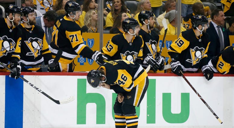Zach Aston-Reese skates off the ice after getting hit by Tom Wilson Zach_Aston_Reese