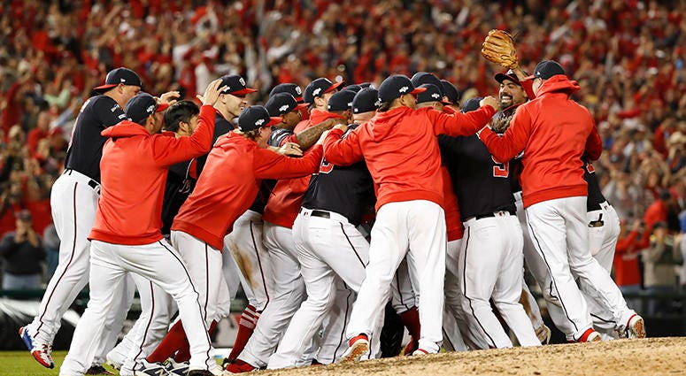 Nationals rush the field to celebrate winning the National League pennant Nationals Win NLCS