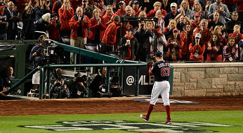 Sean Doolittle walks off the field after holding the 7-4 lead over 1.2 innings in Game 4 of the NLCS Sean Doolittle NLCS Game 4