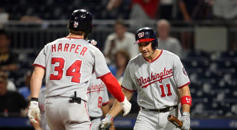 Bryce Harper and Ryan Zimmerman high five after a Harper home run. Bryce_Harper_Ryan_Zimmerman