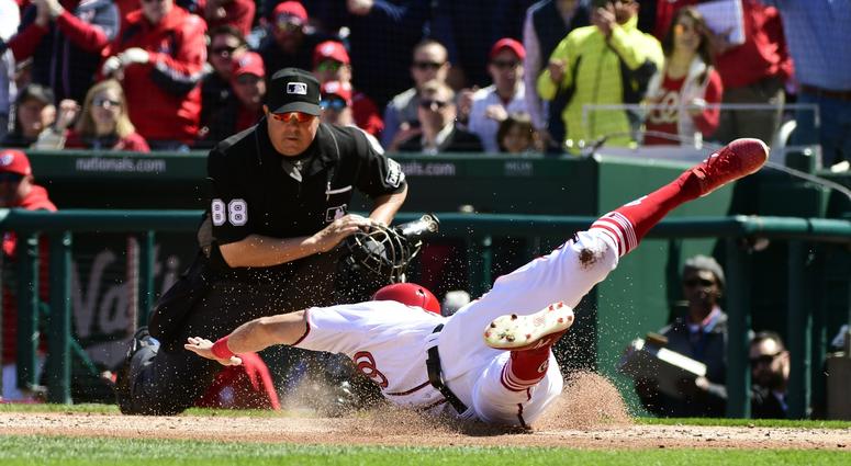 Adam Eaton slides into home plate in the third inning against the Mets Adam_Eaton_Slide
