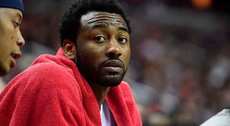 John Wall sitting on the bench. John_Wall