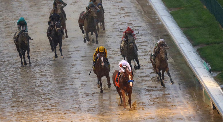 Justify crossing the finish line at the Kentucky Derby Justify_Kentucky_Derby
