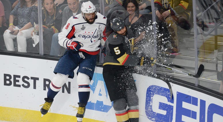 Ovi chases the puck with Vegas defenseman Deryk Engelland Alex_Ovechkin_Game_5