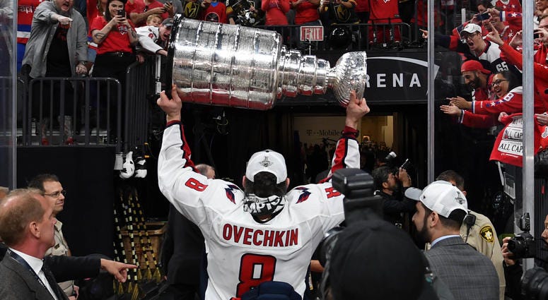 Alex Ovechkin raises the Stanley Cup. Washington_Capitals_Stanley_Cup