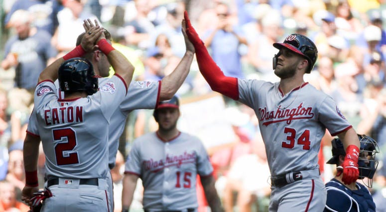 Bryce Harper celebrates a homer with teammates Adam_Eaton_Bryce_Harper