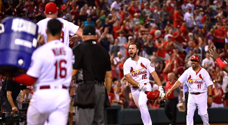 The Cardinals celebrate Paul DeJong's walk-off home run against the Nationals. Paul_DeJong