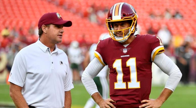 Jay Gruden confers with QB Alex Smith before a preseason game against the Jets Alex_Smith_Jay_Gruden