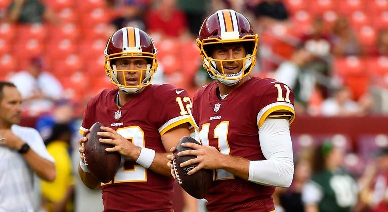 Alex Smith and Colt McCoy of the Washington Redskins. Alex_Smith_Colt_McCoy