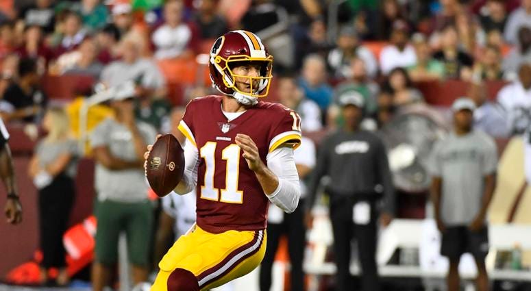 Alex Smith dropping back to pass. Alex_Smith