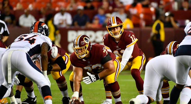 Alex Smith surveys the field during the Redskins' preseason game against the Denver Broncos. Alex_Smith_Broncos