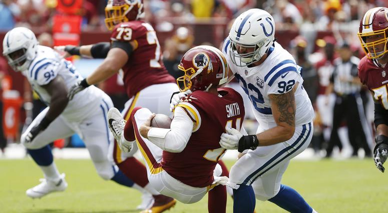 Alex Smith is sacked by Margus Hunt of the Colts. Alex_Smith_Sack