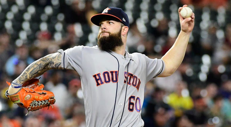 Dallas Keuchel pitches for the Houston Astros. https://thefandc.radio.com/danny-rouhier-comes-back-florida-without-voice
