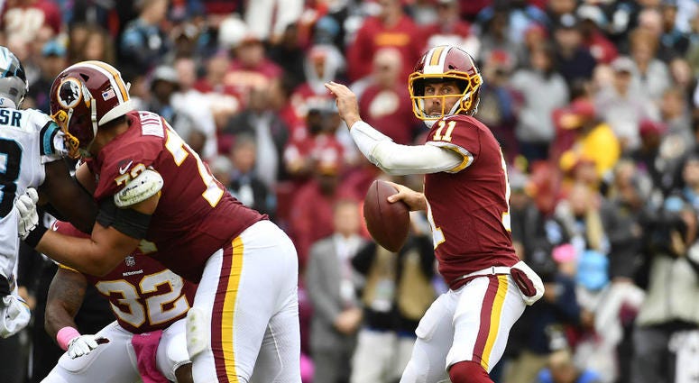Redskins QB Alex Smith throws a pass. Washington_Alex_Smith