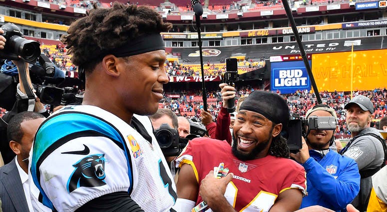 Josh Norman chats with Cam Newton postgame. Josh_Norman_Cam_Newton