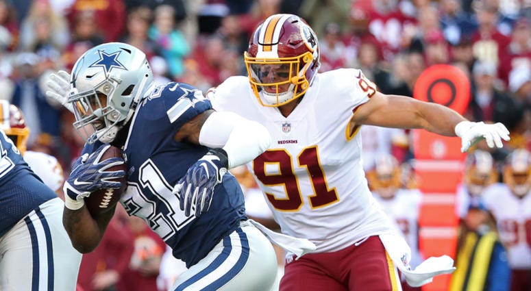 Ryan Kerrigan pursues Ezekiel Elliott. Ezekiel_Elliott_Redskins