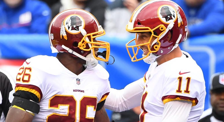 Alex Smith and Adrian Peterson of the Washington Redskins adrian_peterson_alex_smith_redskins
